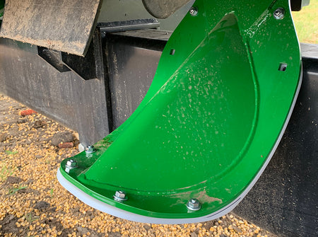 John Deere C-Series OEM stalk stomper with May Wes poly cover installed.