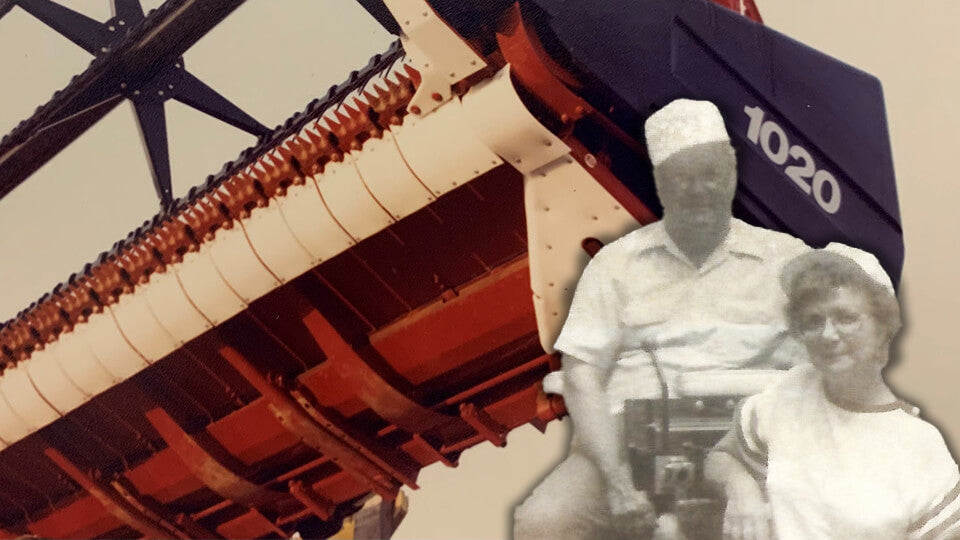 Mavis and Wesley Bruns, founders of May Wes Manufacturing, in front of Case IH 1020 header with UHMW poly skid shoes