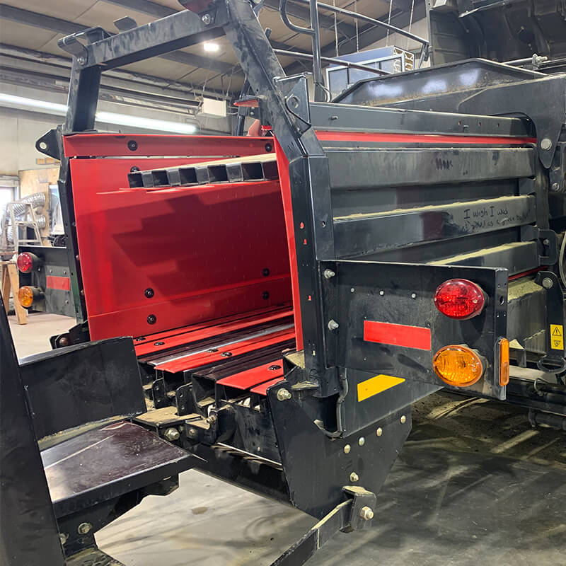 Red BaleSkiis baler liner installed in Case IH square baler at Fast Ag Montana