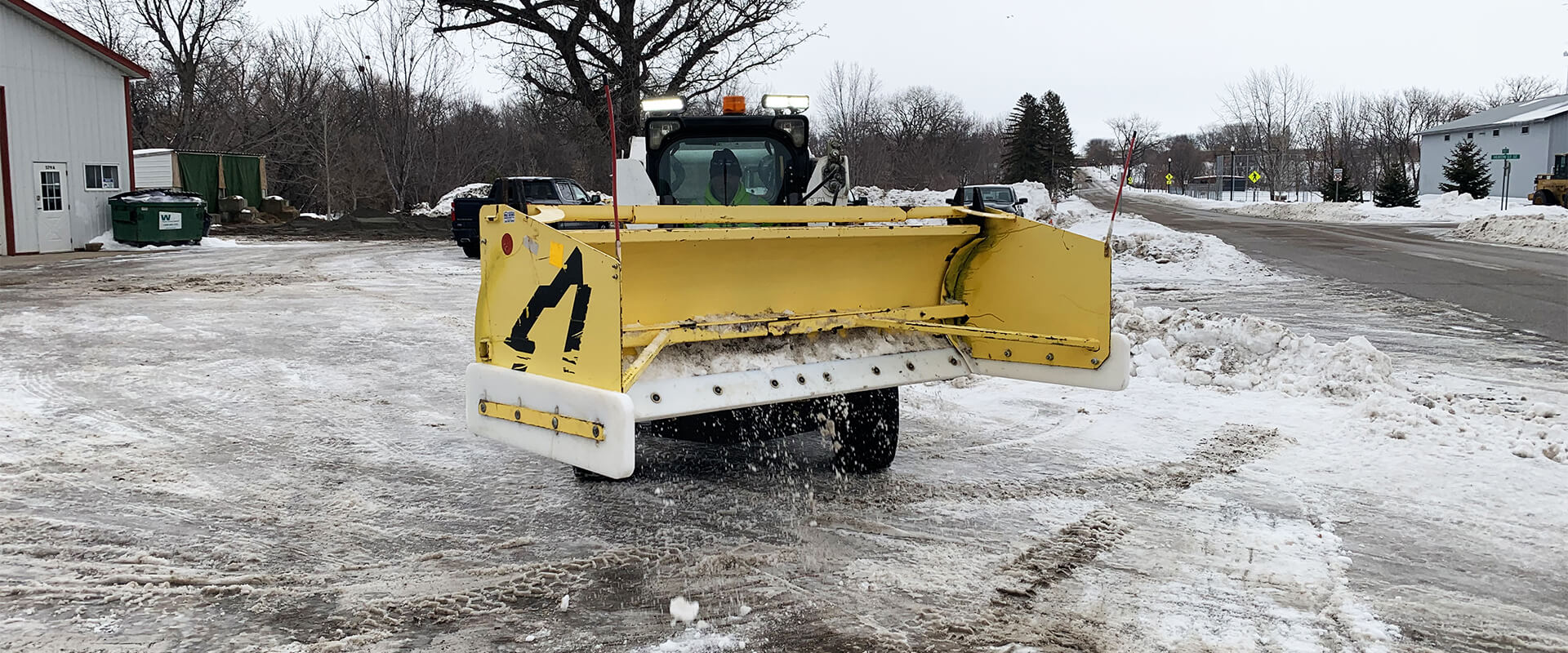 SnowWolf Box Plow with May Wes custom poly cutting edge and skid shoes