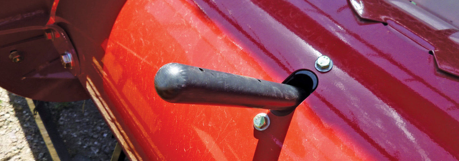 Black poly retractable finger installed in Case IH grain head