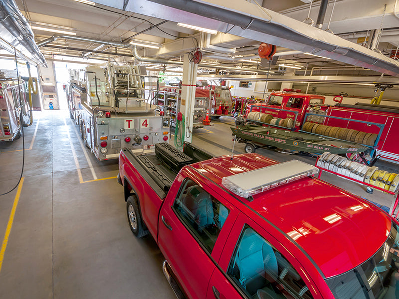Red pickup truck with Du-Ha totes in the bed