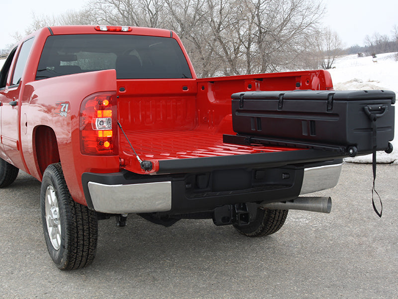 Red pickup truck with tailgate down and Du-Ha storage tote