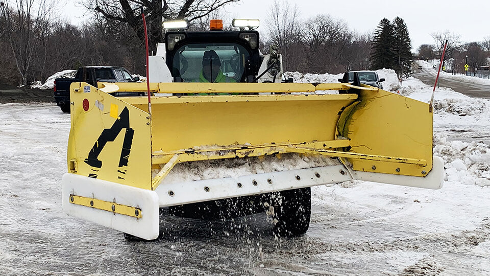 Load video: May Wes poly cutting edge and custom poly skid shoes on yellow SnowWolf box plow/snow pusher