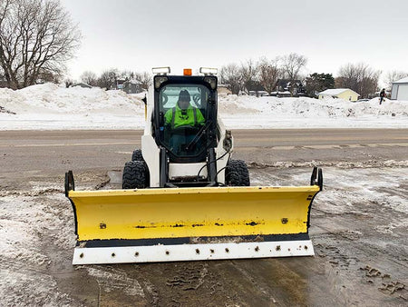 SnowWolf snow plow with plastic cutting edge