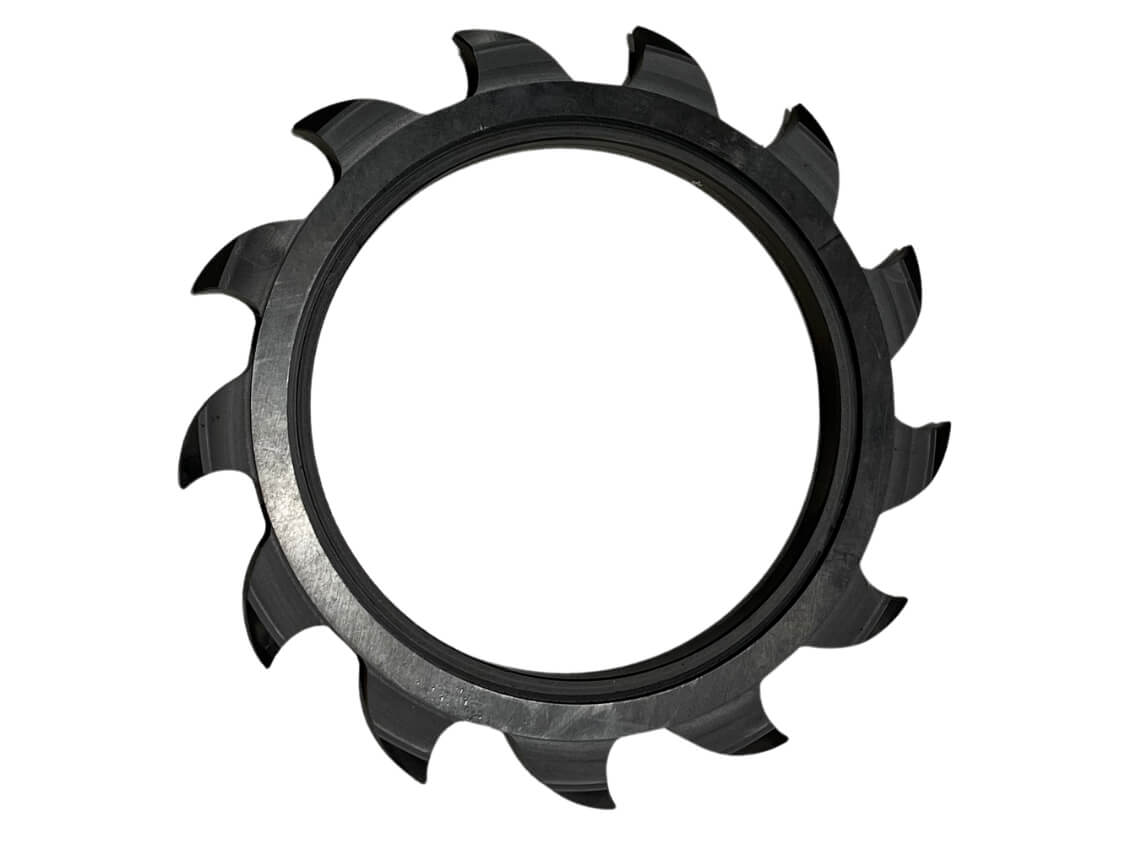 Black wheel with curved points on white background. May Wes Shark Tooth closing wheel. 