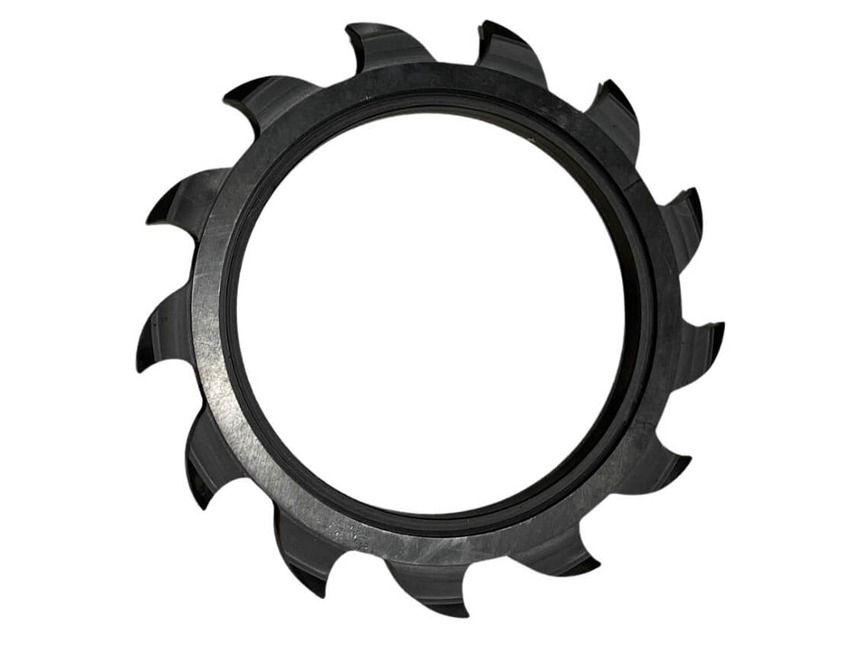Black wheel with curved points on white background. May Wes Shark Tooth closing wheel. 